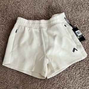 Women’s Alphalete ELMTS shorts, cream, sz medium, brand new
